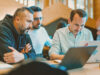 3 employees from conceptboard working together during the pop up office