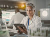 Pharma person bringing digital transformation. 2 people working in a lab digitally