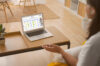remote collaboration with conceptboard. A person sitting in alone in the room with a laptop and conceptboard open being in a meeting with the team